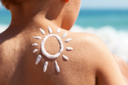 Your skin - child protected under the sun